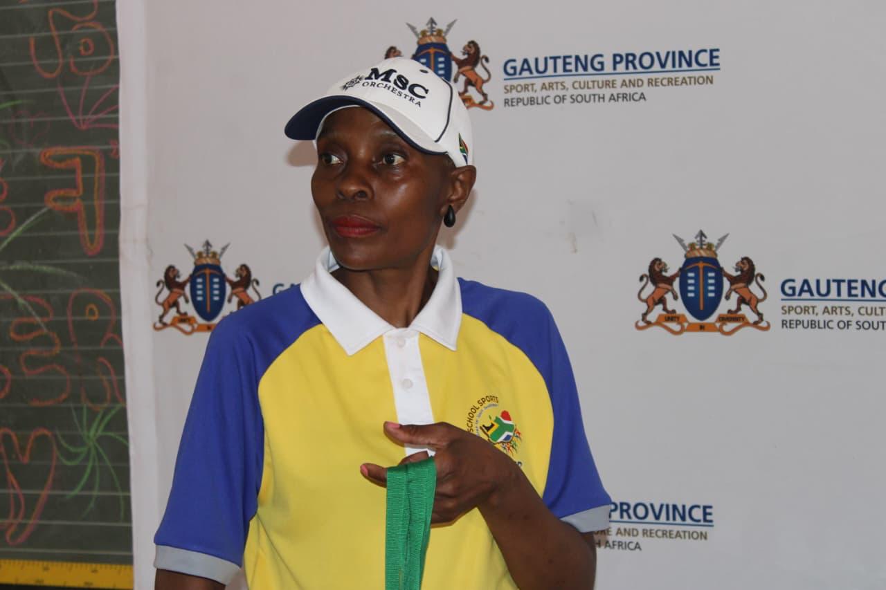 Coach Nelly Manyashi